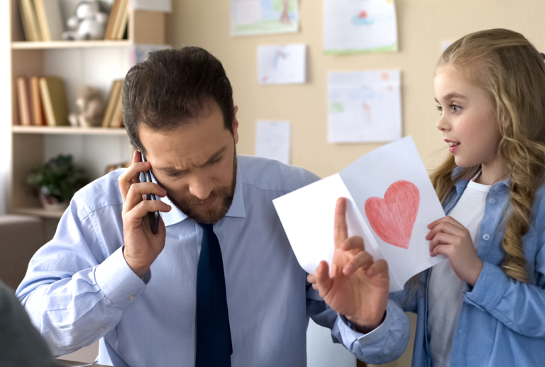 A father being interrupted on the phone from daughter