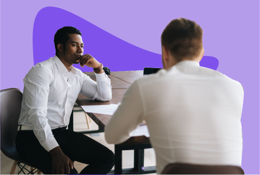 Man discussing performance reviews